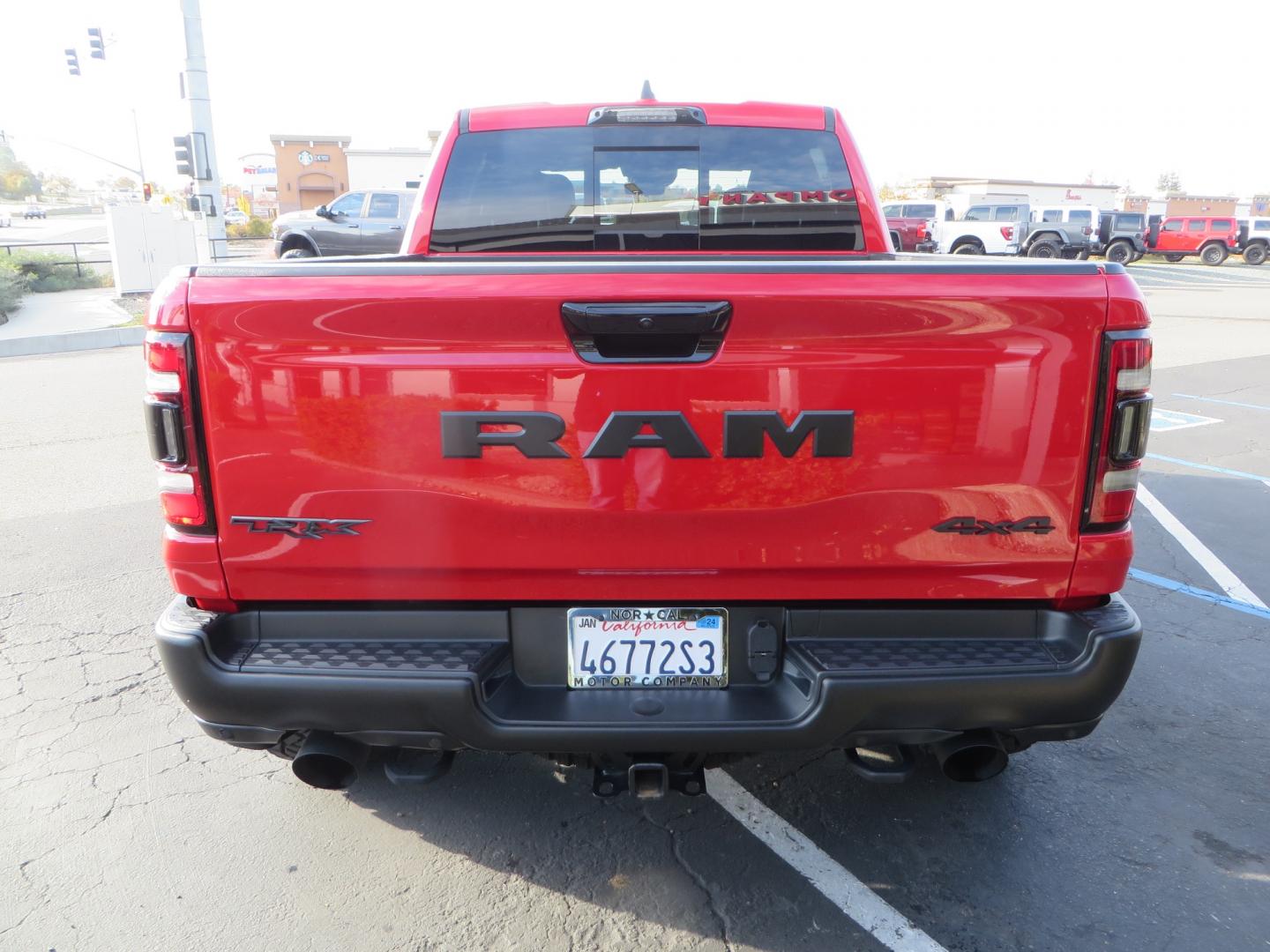 2023 Red /BLACK RAM 1500 Ram 1500 TRX Crew Cab 4x4 (1C6SRFU9XPN) with an 6.2L Supercharged HEMI V8 SRT engine, 8 Speed Auto 8HP95 transmission, located at 2630 Grass Valley Highway, Auburn, CA, 95603, (530) 508-5100, 38.937893, -121.095482 - Must see TRX featuring Eibach front and rear springs, 18" Method NV double black wheels, 37" Nitto Ridge Grappler tires, and window tint. - Photo#6